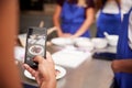 Close Up Of Woman Taking Photo Of Pancake Dish For Social Media In Cookery Class