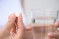 Close up of woman taking in pill, Medicine, health care Royalty Free Stock Photo