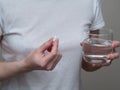 Close up of woman taking in pill, Medicine, health care and people concept Royalty Free Stock Photo