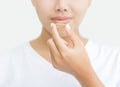 Close up woman taking vitamin capsule