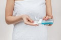 Close-up woman in towel holding cotton pad and makeup remover Royalty Free Stock Photo