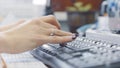 Close-up of woman typing on keyboard. Action. Beautiful female hands with manicure quickly type on keyboard. Woman Royalty Free Stock Photo