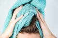 Female drying her hair with towel Royalty Free Stock Photo