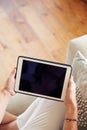 Close Up Of Woman Using Digital Tablet At Home Royalty Free Stock Photo