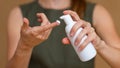 Close-up of a woman using hand moisturizing cream Royalty Free Stock Photo