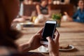 Close Up Of Woman Using Mobile Phone In cafe Royalty Free Stock Photo