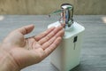 Close up woman wash her hands in bathroom with liquid soap in white bottle