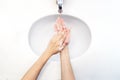 Close up of woman washing her hands Sinks top view