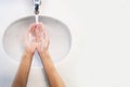 Close up of woman washing her hands Sinks top view