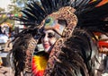 SAN ANTONIO, TEXAS - OCTOBER 29, 2017 - Woman wearing Aztec headdress for Dia de Los Muertos/Day of the Dead celebration