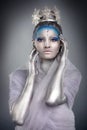 Close up of a woman wearing creative make up as Ice Queen