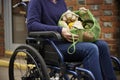 Close Up Of Woman In Wheelchair Holding Zero Waste Packaging Shopping In Sustainable Bag