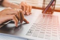 Close up woman working on laptop at home office Royalty Free Stock Photo