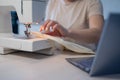 Close-up. A woman works on an electric sewing machine at home Royalty Free Stock Photo