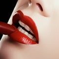 Close-up of woman& x27;s lips with fashion red make-up. Beautiful female mouth, full lips with perfect makeup Royalty Free Stock Photo