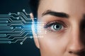 Close up of womans eye with digital circuit, technology concept Royalty Free Stock Photo