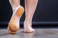 Close up of womans foot covered with tinsel Royalty Free Stock Photo