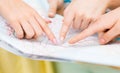 Close up of women hands pointing finger to map Royalty Free Stock Photo
