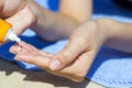 close up of women hands receiving sunblock cream Royalty Free Stock Photo