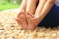 Close up of women relaxation and massage on a rock, Healthcare and spa stones concept