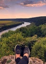 Close up of women`s foots on panoramic view on river Dniester in the Soroca town on summer, Moldova, the north-eastern part of th