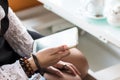 Close up of women`s hands holding cell telephone blank copy spac Royalty Free Stock Photo