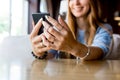 Close up of women`s hands holding cell telephone with blank copy space scree for your advertising text message or Royalty Free Stock Photo