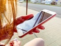 Close up of women`s hands holding cell telephone with blank copy space scree for your advertising text message or promotional con Royalty Free Stock Photo