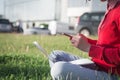 Close up of women& x27;s hands holding cell telephone outdoor with blank copy space scree for your advertising text message Royalty Free Stock Photo