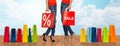 Close up of women with sale sign on shopping bag Royalty Free Stock Photo