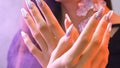 Close-up on women's hands with delicate skin