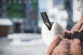 Close up of women's hands holding cell telephone outdoor with blank copy space scree for your advertising text message Royalty Free Stock Photo