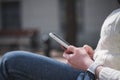 Close up of women& x27;s hands holding cell telephone outdoor with blank copy space scree for your advertising text message Royalty Free Stock Photo