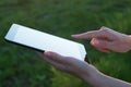 Close up of a womman using mobile tablet pc