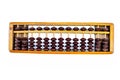 Close up of wooden abacus or counting frame with brown colored beats in it.Isolated on  white. Royalty Free Stock Photo