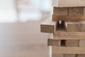 Close up of wooden blocks tower Jenga and copy space Royalty Free Stock Photo