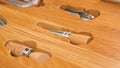 Close-up of wooden box for kitchen tools. Household utensils. Modern stylish design of kitchen drawer with wooden stand Royalty Free Stock Photo