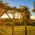 Close up of a wooden Chuppah with flowers and lace Royalty Free Stock Photo