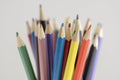 Close up of wooden colorful pencils, group of scattered crayons, isolated od white background Royalty Free Stock Photo