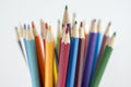 Close up of wooden colorful pencils, group of scattered crayons, isolated od white background Royalty Free Stock Photo