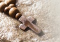 Close up of wooden cross on beach