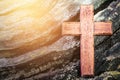 Close up of wooden cross on old wood texture background Royalty Free Stock Photo