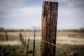 Fence post with wire Royalty Free Stock Photo