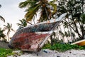 Close-up wooden fishing boat on tropical beach Royalty Free Stock Photo