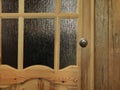 Wooden internal door with a glass