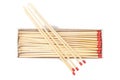 Wooden matchstick box with three matches sitting on top Royalty Free Stock Photo