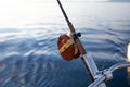 A close up of a wooden mooching reel on a fishing rod Royalty Free Stock Photo