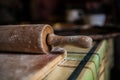 Close Up of a Wooden Rolling Pin in Kitchen