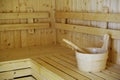 Wooden sauna bucket accessories interior of sauna spa Royalty Free Stock Photo