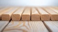 Close up of wooden shims lying on a table creating a pattern, carpentry and woodworking concept, minimalist style Royalty Free Stock Photo